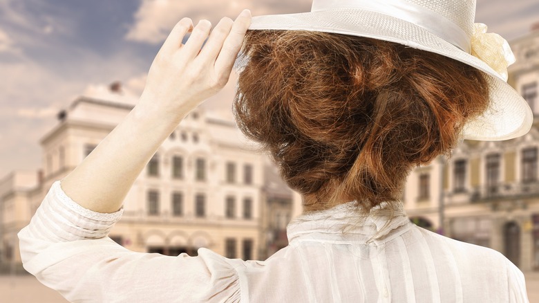 woman in white historical clothing