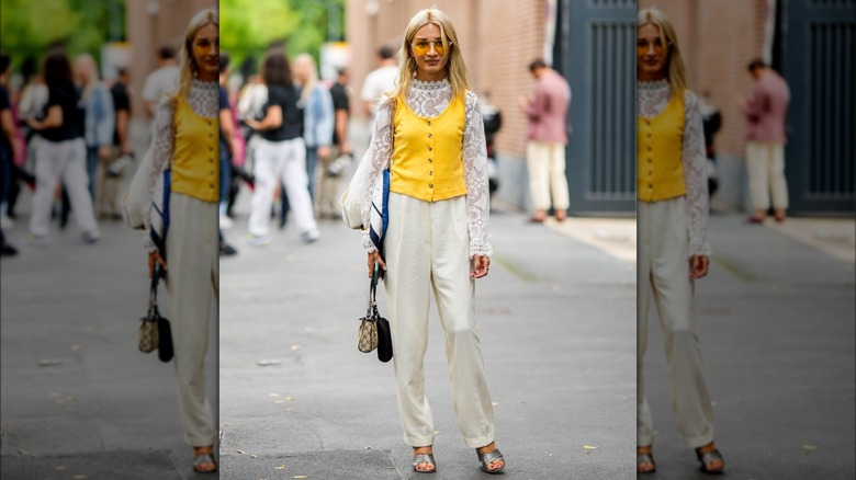 woman wearing yellow tuxedo top