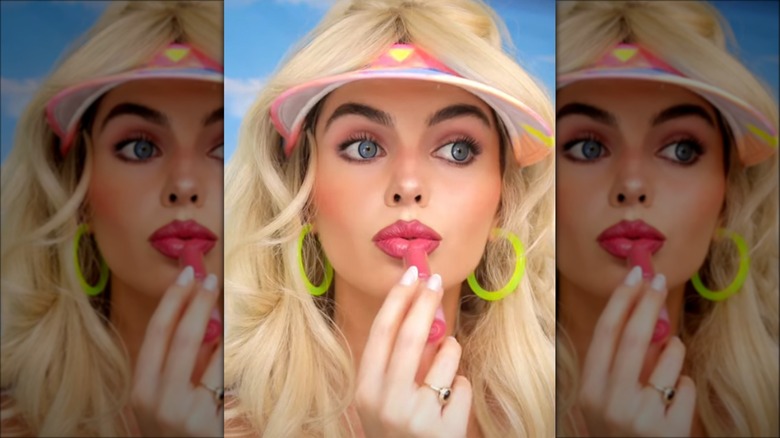 woman doing Barbie makeup