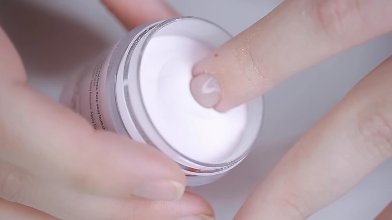 Nail dipped in powder