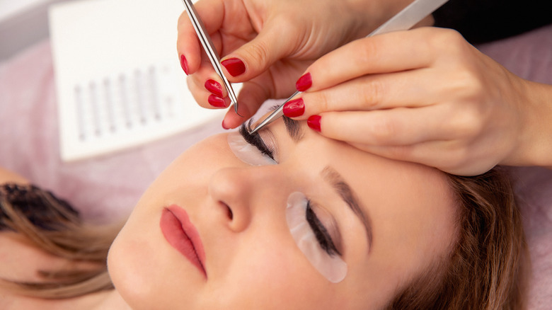 Woman getting her lashes done 