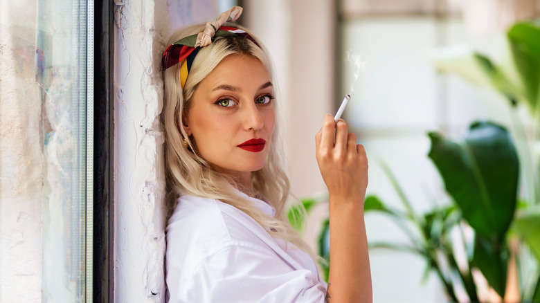 Blonde smoking a cigarette