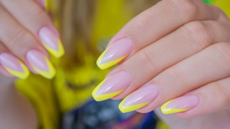 ballerina nails with angled yellow french tips