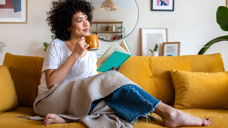 smiling woman sitting alone