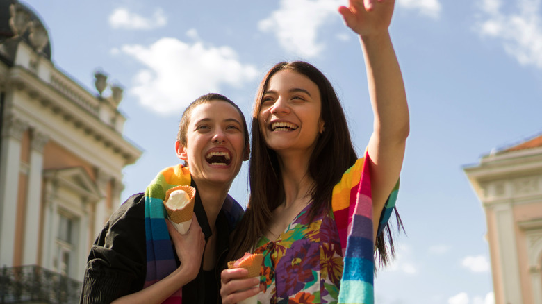 smiling woman eating ice cream