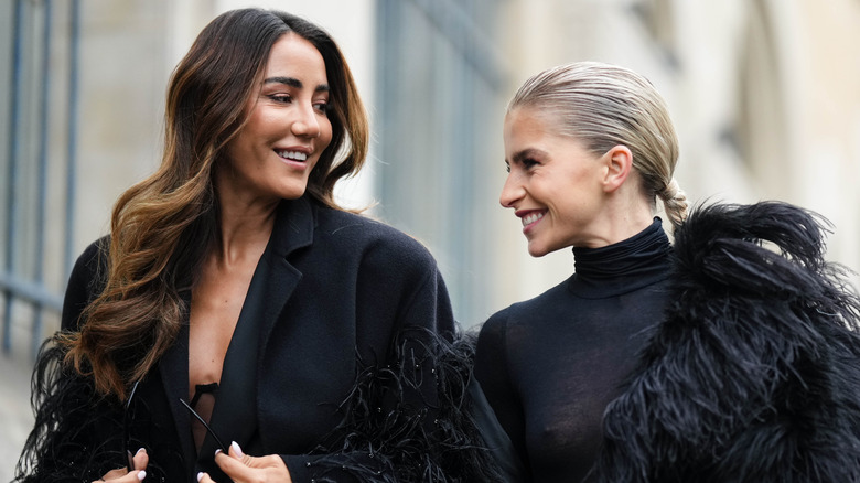 smiling woman in all black