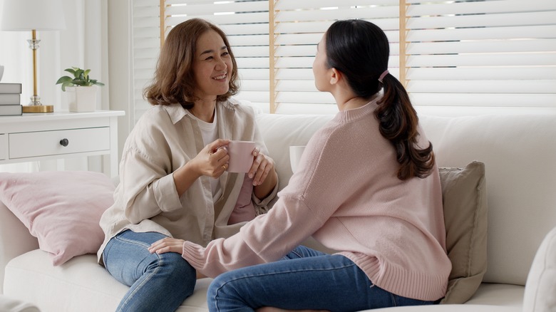 friends talking on a couch