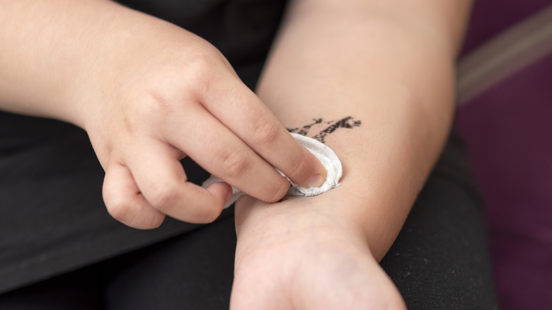 rubbing alcohol on tattoo