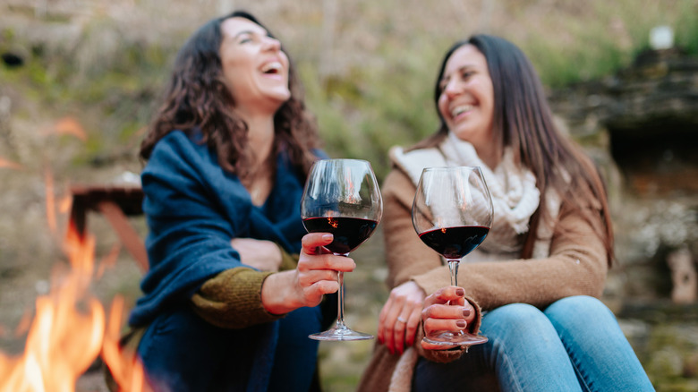 campers drinking wine