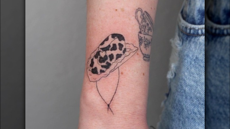 Cow print cowboy hat