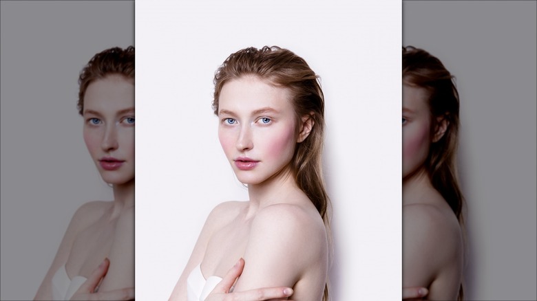 woman with rosy cheeks