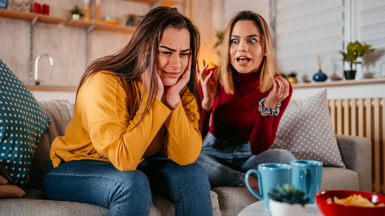 woman yelling at crying partner