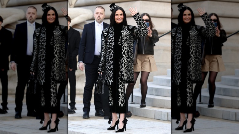 Demi Moore poses outside the Schiaparelli show