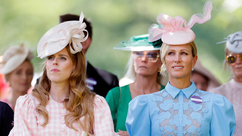 Princess Beatrice stands with Zara Tindall at the Royal Ascot
