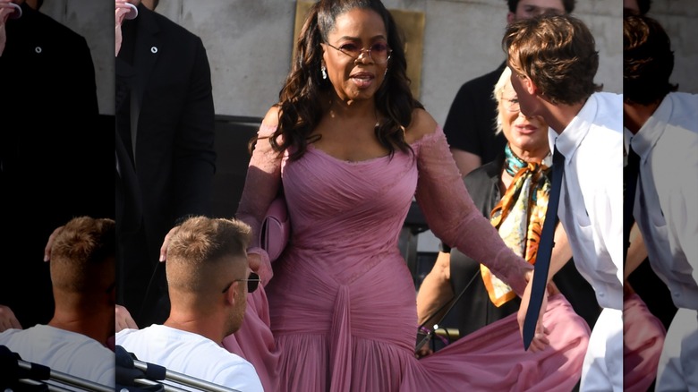 Oprah Winfrey wearing a fabric-heavy pink dress at ﻿Lauren Sánchez and Jeff Bezos' wedding weekend
