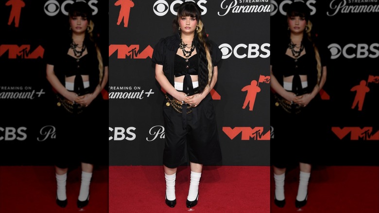 Lola Young poses for a photo