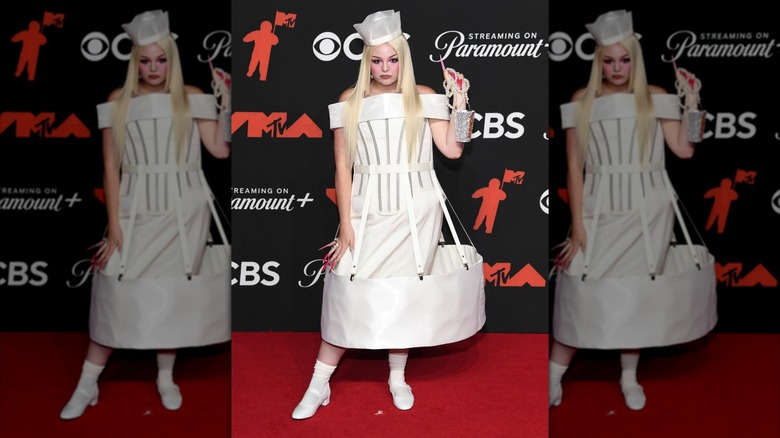 Megan Stalter stands on the red carpet