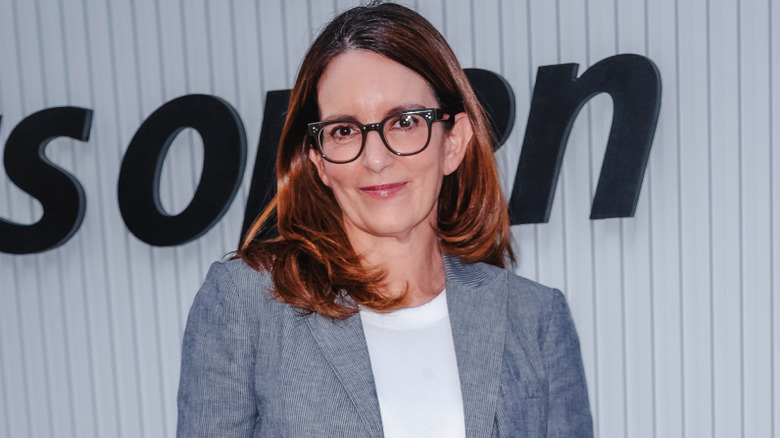 Tina Fey at the US Open posing for a picture