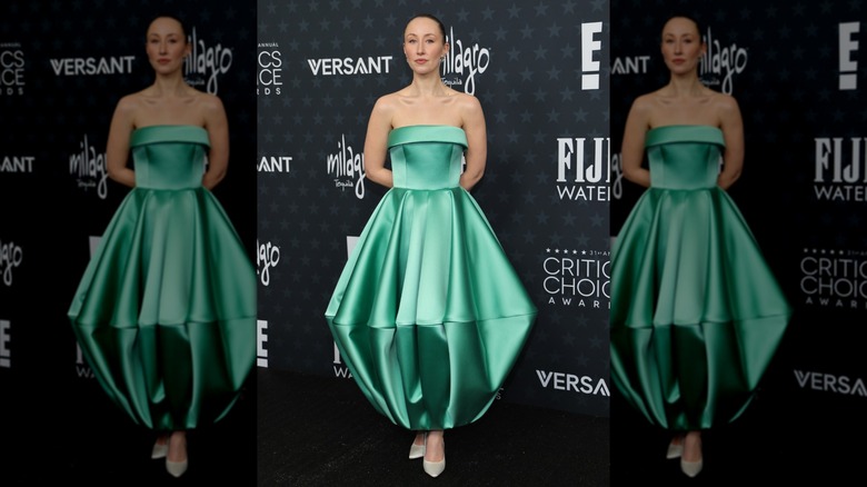 Erin Doherty poses on the red carpet