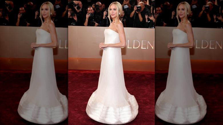 Brittany Snow poses while walking the red carpet at the Golden Globes