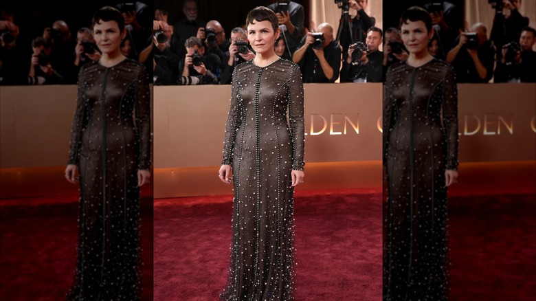 Ginnifer Goodwin stands on the Golden Globes red carpet