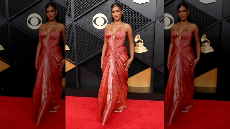 Monet Mcmichael poses on the Grammy red carpet