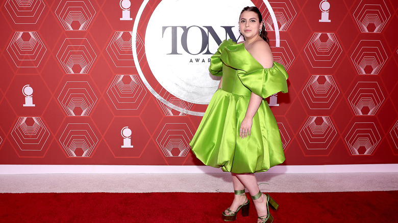Beanie Feldstein in a bright green dress in 2021