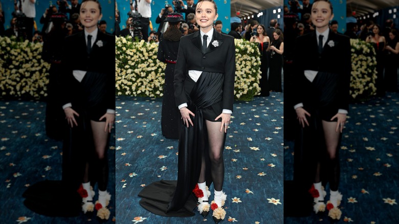 Aimee Lou Wood wearing a chaotic black ensemble at the May 2025 Met Gala