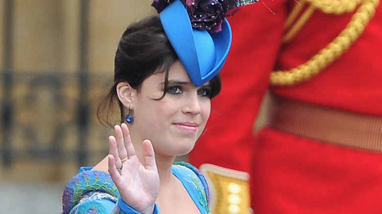 Princess Eugenie waves to the crows at the royal wedding