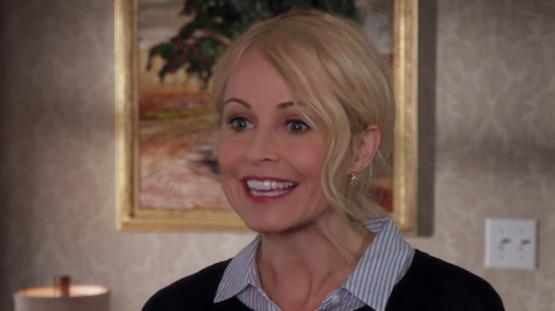 Josie Bissett wearing a bad blond wig in The Wedding March