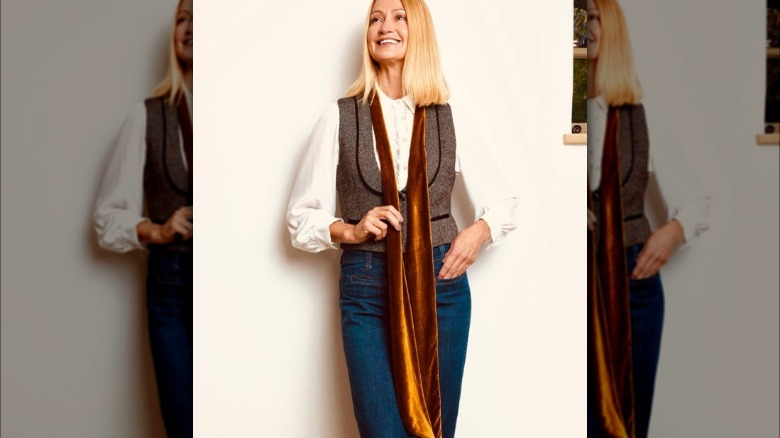 a woman wearing a velvet skinny scarf