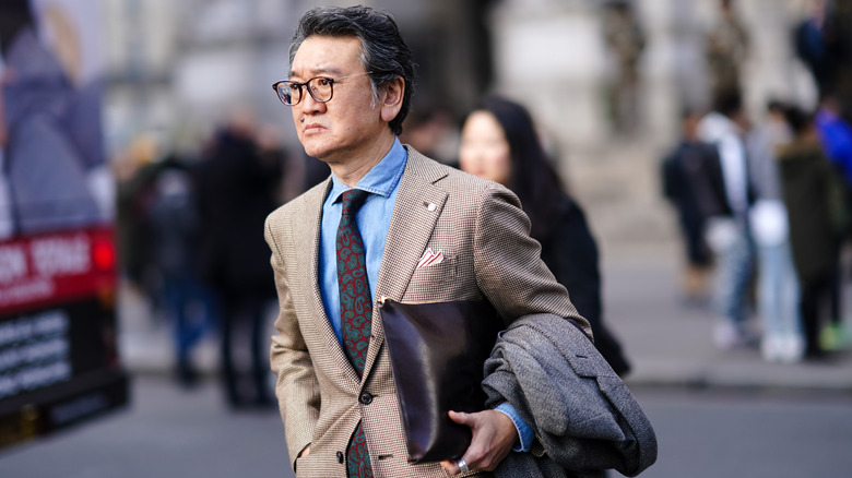 Businessman walking with briefcase