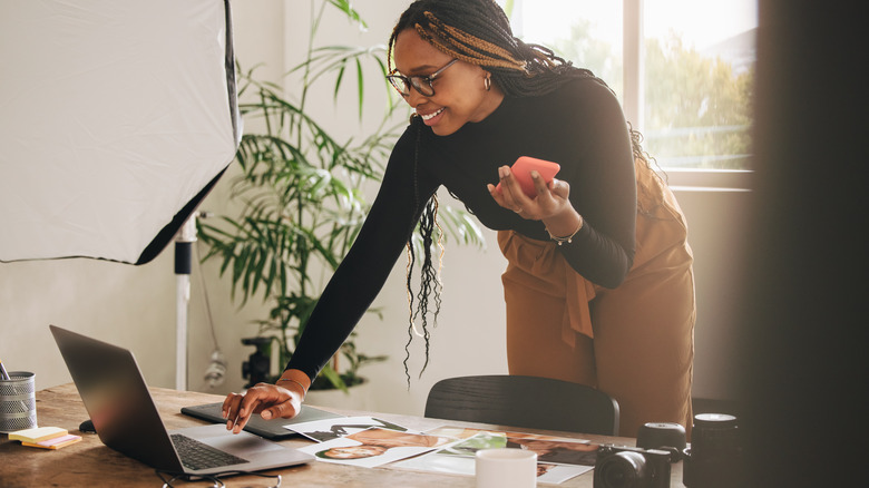 Smiling woman working hard 