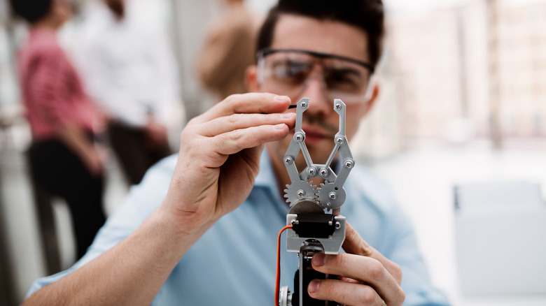 Person working on robotics creation