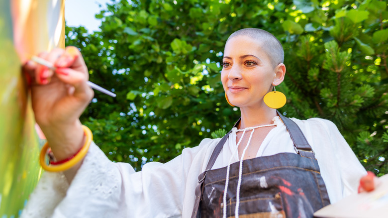 Woman painting as therapy