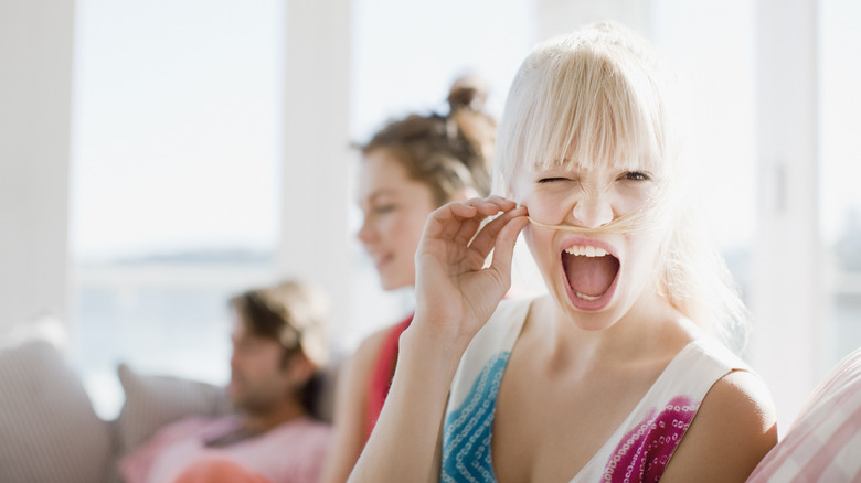 Silly woman with hair mustache