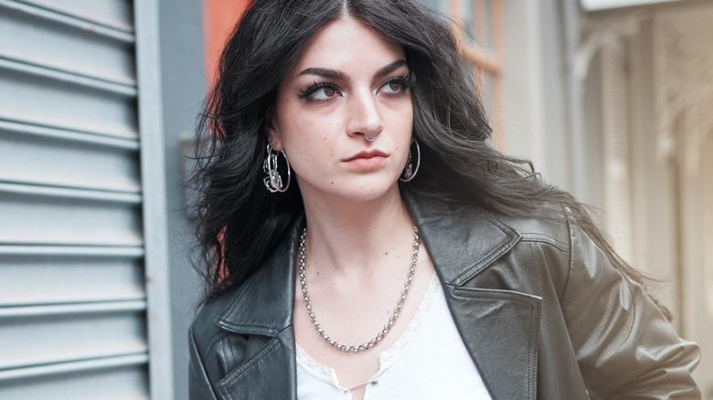 Edgy fashionable woman on street