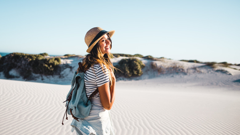 independent woman traveling alone