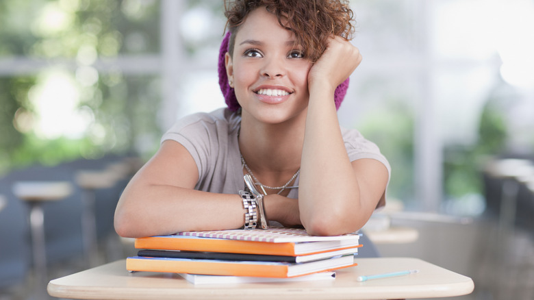 Happy woman daydreaming