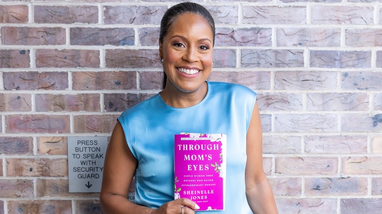 Sheinelle Jones poses with her book "Through Mom's Eyes."