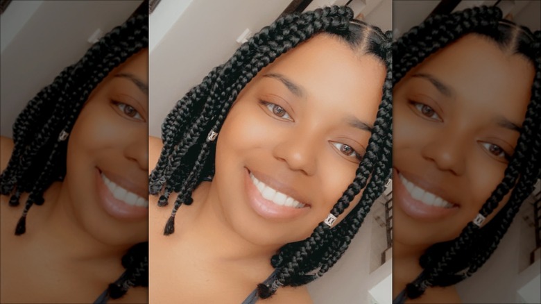 woman wearing hair in short box braids