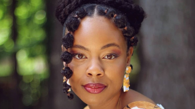 woman with bubble braid bangs