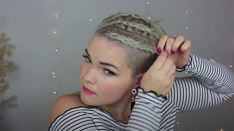 woman with angled pixie braids