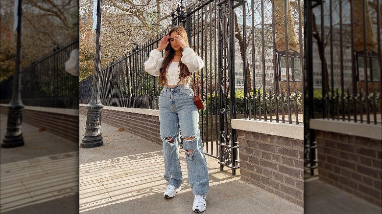 Girl wearing wide-leg jeans.