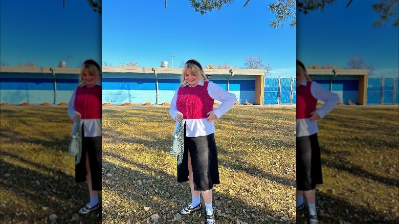 Girl wearing midi split skirt.