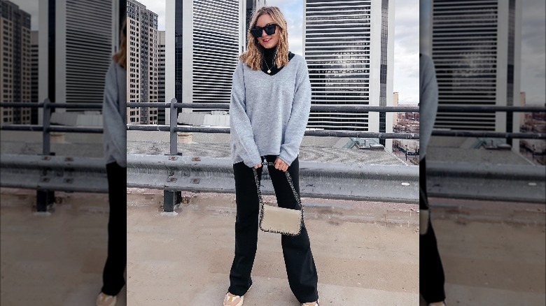 Girl wearing flared leggings.