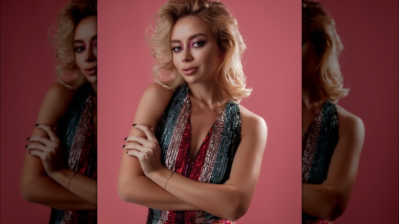 A woman in a sequin outfit