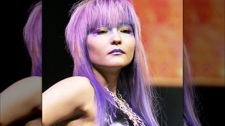 A woman with colorful eye makeup