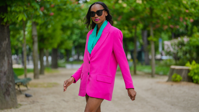 A woman in a neon outfit