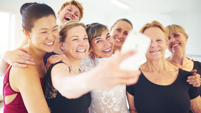 a group of people taking a picture